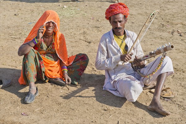 Indian men with a turban and wearing the traditional men's garment Dhoti