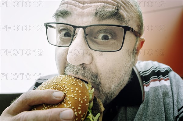Man eating a hamburger