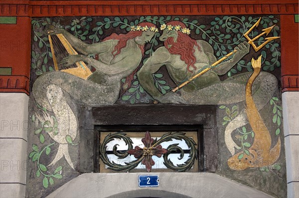 Poseidon with trident and mermaid
