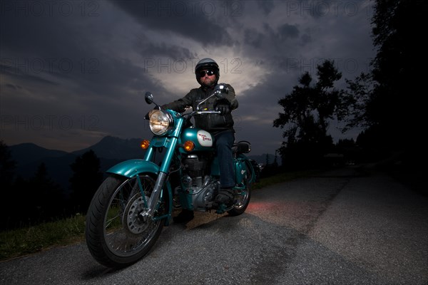 Motorcycle rider on his motorbike