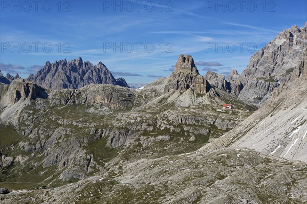 Dreizinnenhuette or Three Peaks Alpine hut with Toblinger Knoten Mountain