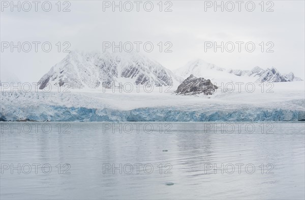 Edge of Smeerenburg Glacier with flashes of light