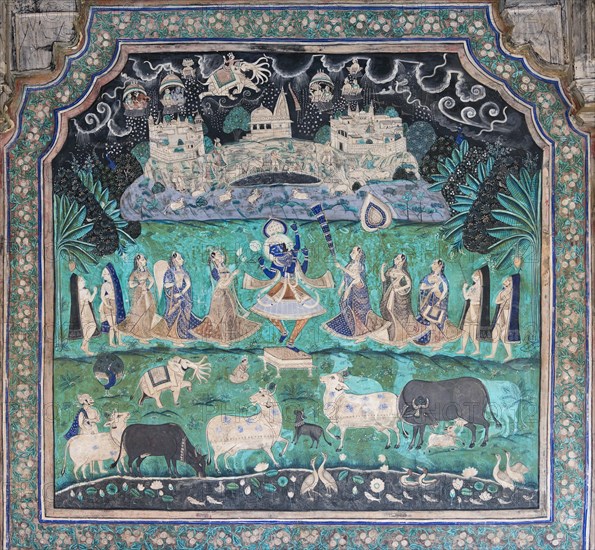 Pastoral god Krishna performing a miracle and lifting the Govardhan Mountain in the sky