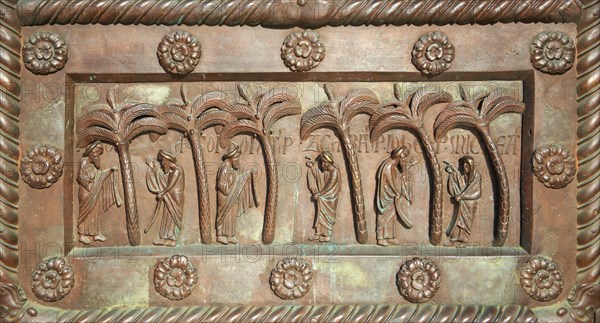 Medieval sculptural reliefs on the door of the Baptistry of St. John