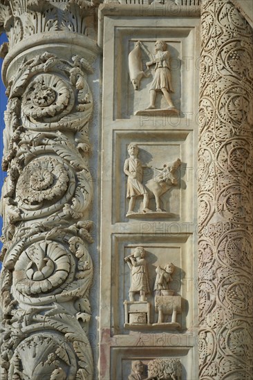 Medieval sculptural reliefs on the door of the Baptistry of St. John
