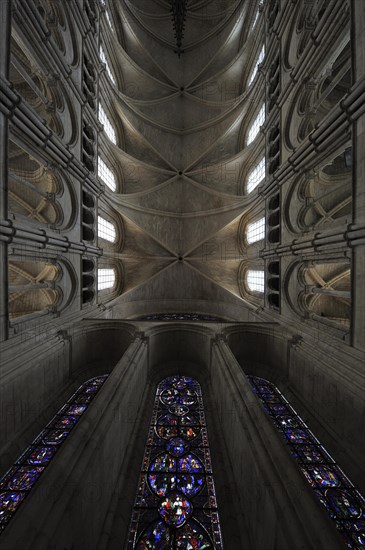 Vaulted ceiling and stained-glass windows