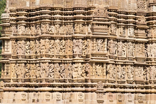 Relief sculptures of gods and men on the façade of the Kandariya Mahadeva temple