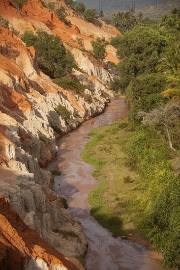Red sandstone formations of the canyon on Fairy Stream