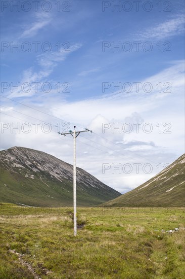 Telegraph pole and cables with Glas Bheinn Mhor at the back