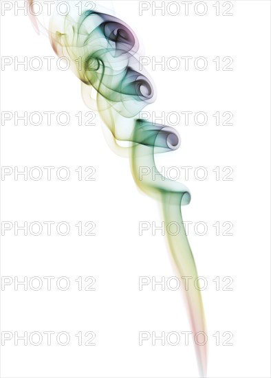 Colourful smoke from an incense stick or joss stick