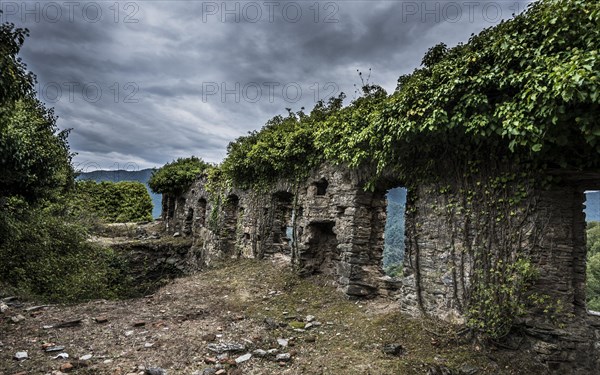 Ruins of the church of Santa Maria di Riscamone against dramatic sky