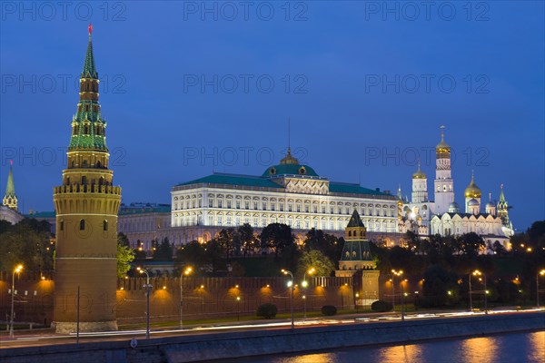 Moscow Kremlin with palace and cathedrals on Moskva River at night