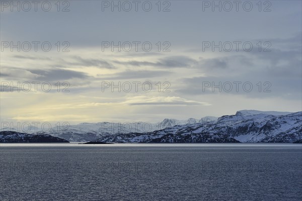 Rocky island landscape at the north sea with cloudy sky