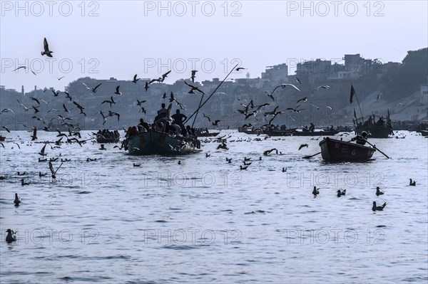 Boats full of people navigating on the Ganges river