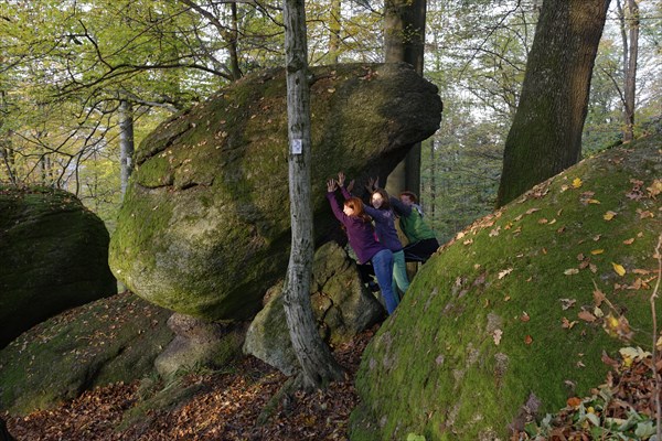 Family hiking in a rock park