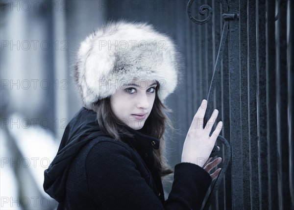 Young woman wearing a fur hat