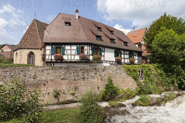 Oberhof Chapel and half-timbered houses on the river Weiss