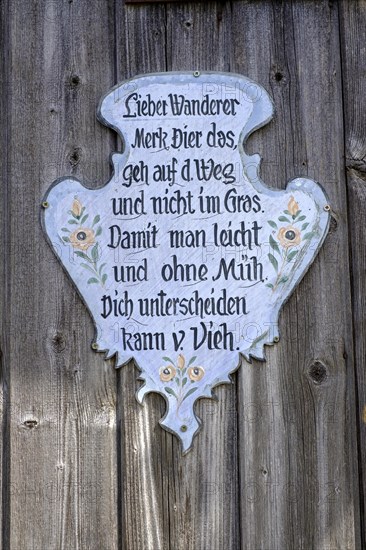 Sign with saying for hiking