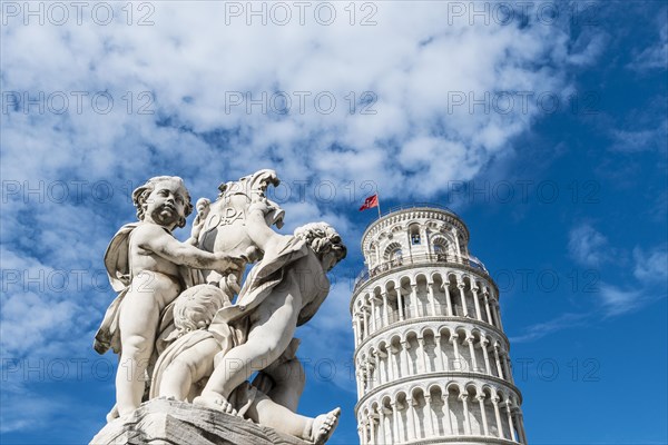 Sculpture in front of the Leaning Tower of Pisa