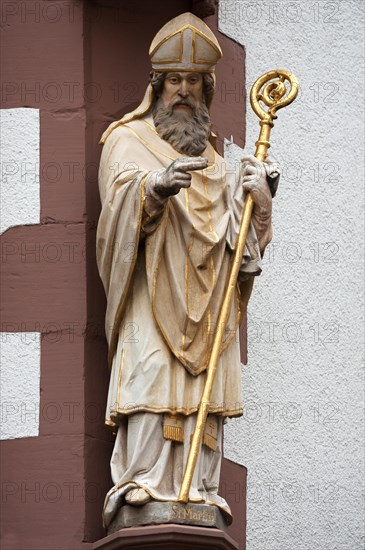 Sculpture of the Saint Martin at a corner house