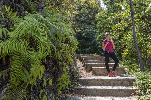 Female hiker on the way to Mount Misen