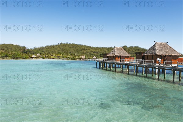 Overwater bungalows in the sea