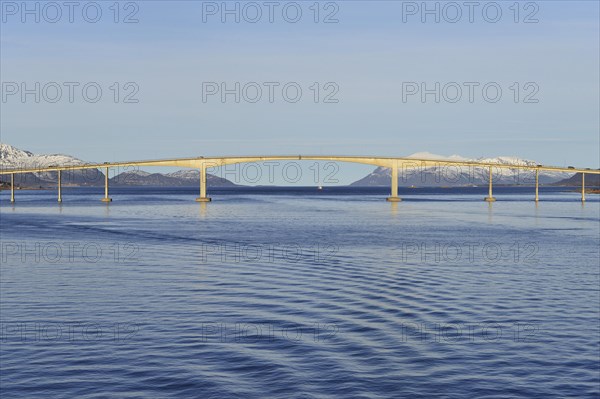 Sortland Bridge over wavy blue waters of Sortlandssundet strait
