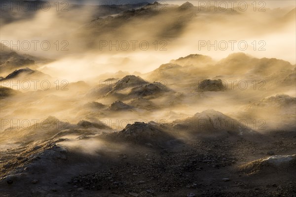 Vapor illuminated in the setting sun