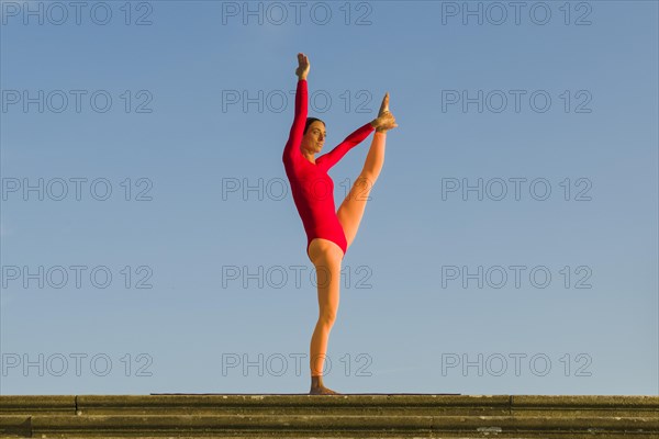 Young woman practising Hatha yoga