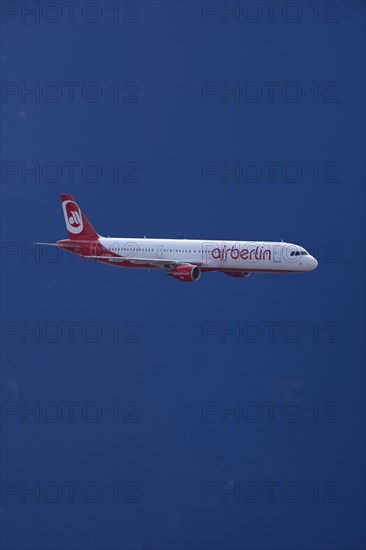 D-ALSA Air Berlin Airbus A321-211 in flight against blue sky