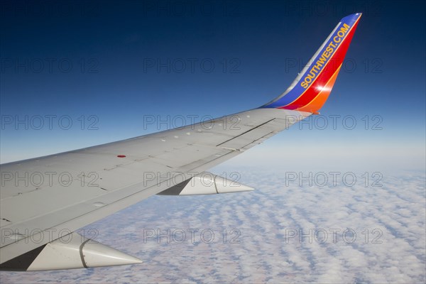 A Southwest Airlines plane flies above Nebraska