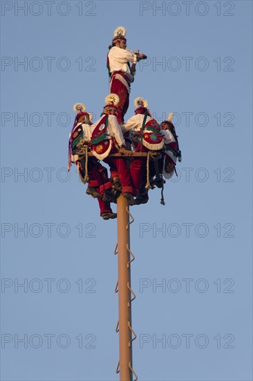 Voladores performing at a village festival