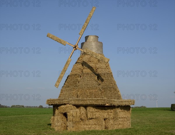 Windmill made of straw bales