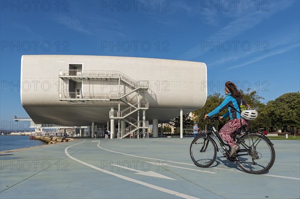 Cyclist outside Centro Botin building