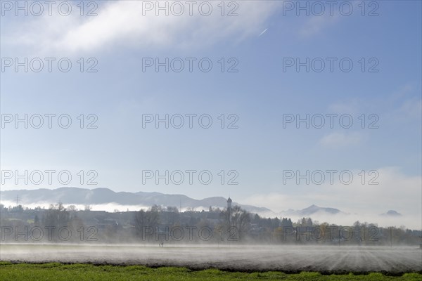Fog above the fields in autumn