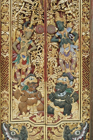 Wooden door decorated with carvings