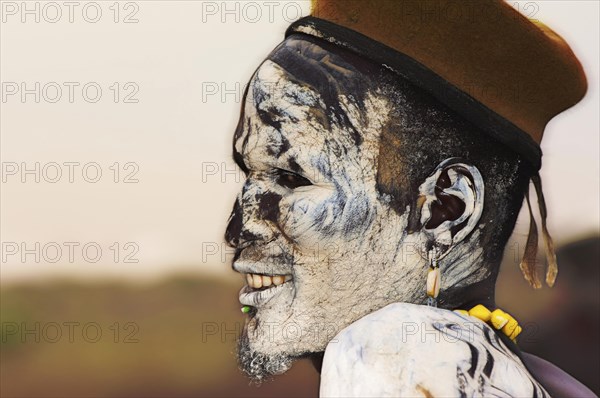 Nyangatom or Bume man with painted face