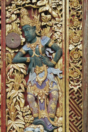 Wooden door decorated with carvings
