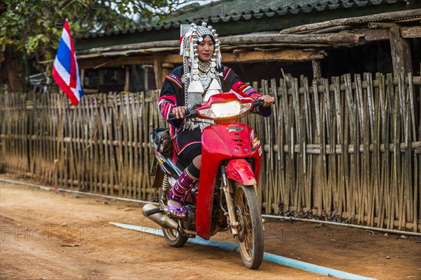 Traditionally dressed young woman from the Akha people