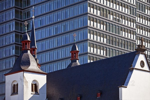 Alt St. Heribert Church in front of Lanxess AG Headquarters