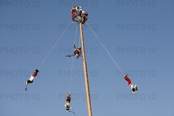 Voladores performing at a village festival
