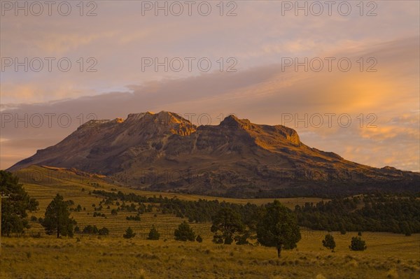 Extinct Volcano Iztaccihuatl in the early morning light from Paso de Cortes