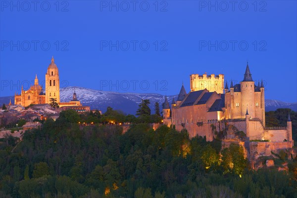Alcazar fortress and cathedral at dusk