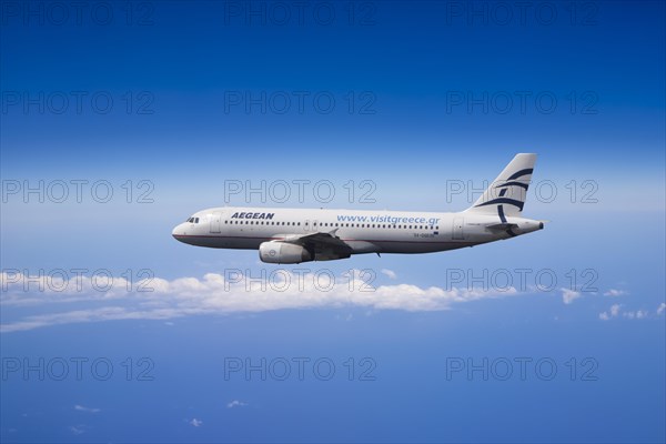 SX-DGD Aegean Airlines Airbus A320-232 in flight over the Mediterranean Sea