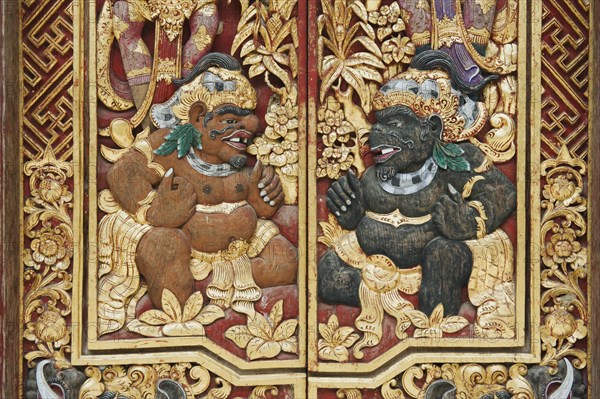 Wooden door decorated with carvings