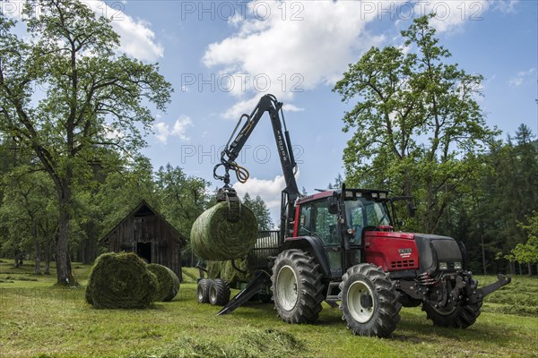 Tractor making hay