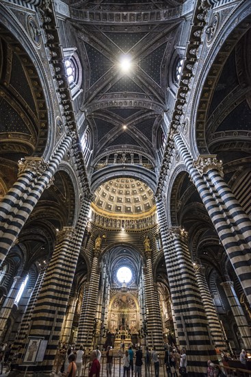 Interior with striped pillars and ornate ceiling