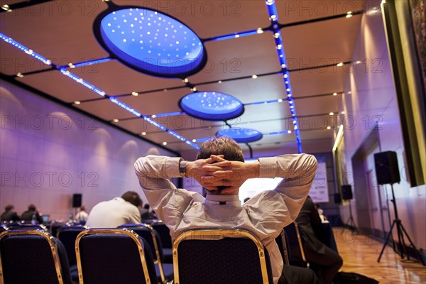Business man during a conference presentation