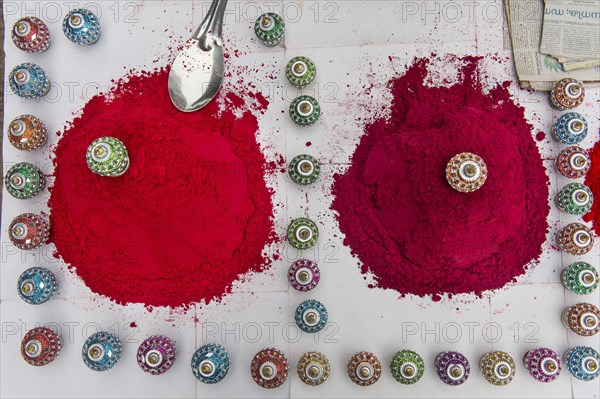 Piles of red Kum Kum powder or Kumkuma