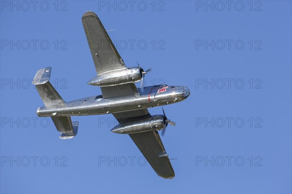 A B-25 Mitchell flying in a flight display during the Red Bull Air Race